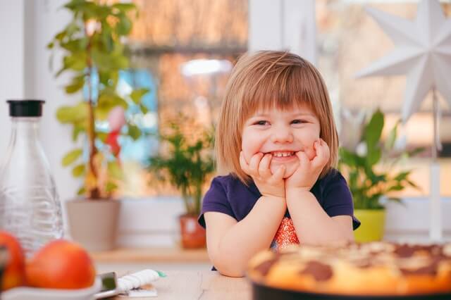 Child smiling at family court attorney